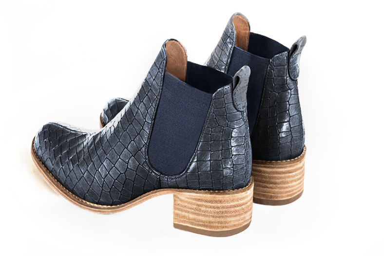 Denim blue women's ankle boots, with elastics. Round toe. Low leather soles. Rear view - Florence KOOIJMAN